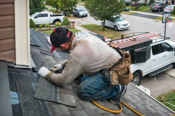 Professional Emergency Roof Repair technician working in Milton, WV